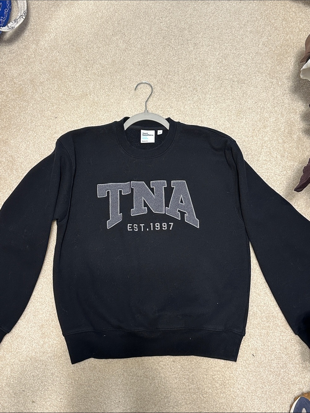 TNA sweater